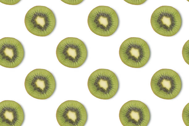 istock Creative seamless pattern made of kiwi, flat lay. Food concept 1337599213