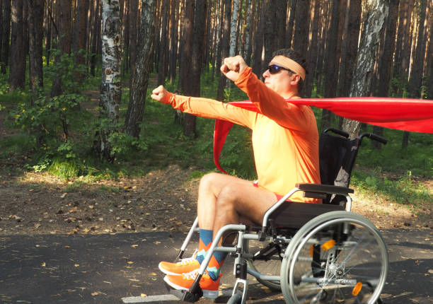 Fast wheelchair racer blurs past. Total motion feel.