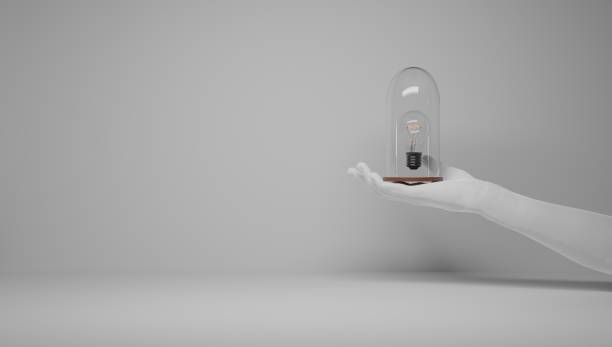 istock Hands protecting an idea. I have an idea and I want to protect it. Patenting an idea. Eureka, I have an idea. Light bulb symbol related to an idea. 1337605458