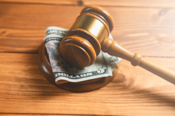 istock court gavel with money on the table 1337605595