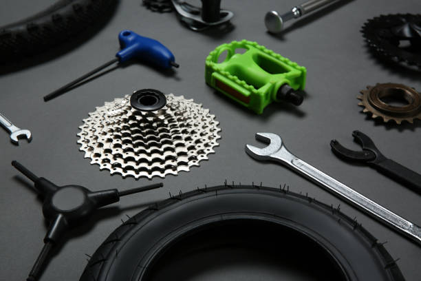 istock Set of different bicycle tools and parts on grey background, closeup 1337607493
