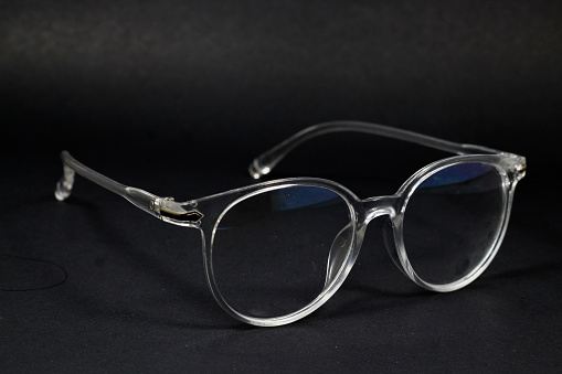 black eyeglasses on white background.