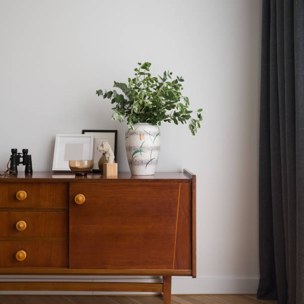 istock Vintage sideboard with stylish decorations 1337615139