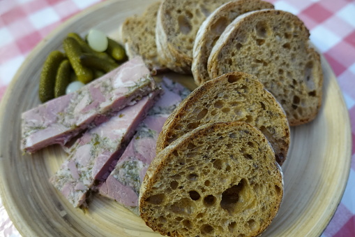 Parsley ham  Sliced bread  Dill pickles  Open sandwich