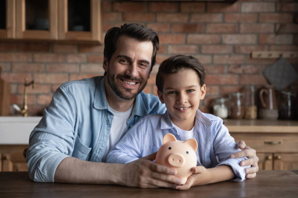 istock Portrait of young dad and son recommend saving 1337616445