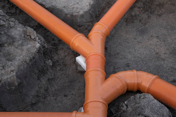 istock Prepared Drainage System from Plastic pipes made by plumber in the ground during the building of a modular house in Europe. Construction Engineering concept 1337616977