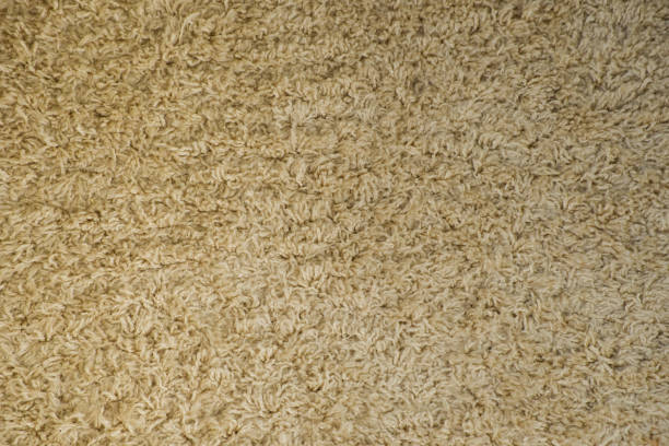 istock Texture of soft woolen carpet as background. Detailed abstract fabric texture. 1337619273