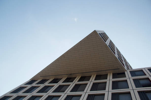 istock Geometric Office Building Side View in the Cityscape 1337622614