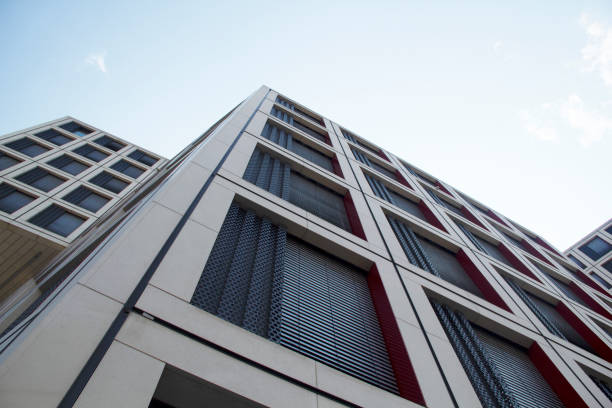 istock Geometric Office Building Side View in the Cityscape 1337622627