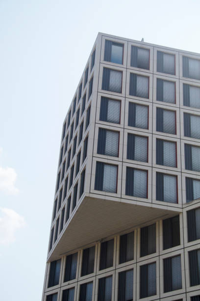 istock Geometric Office Building Side View in the Cityscape 1337622662