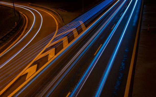istock lights of cars with night. 1337622671