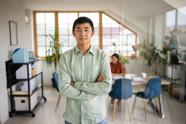 istock Portrait of businessman in modern workplace 1337624663
