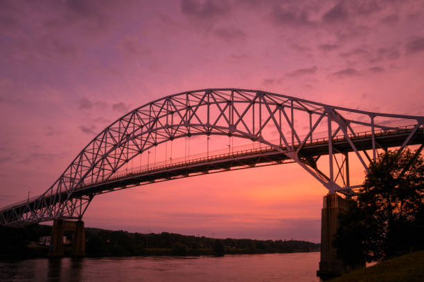 istock Sagamore Bridge over Cape Cod Canal at sunrise with high humidity in the summer 1337626390