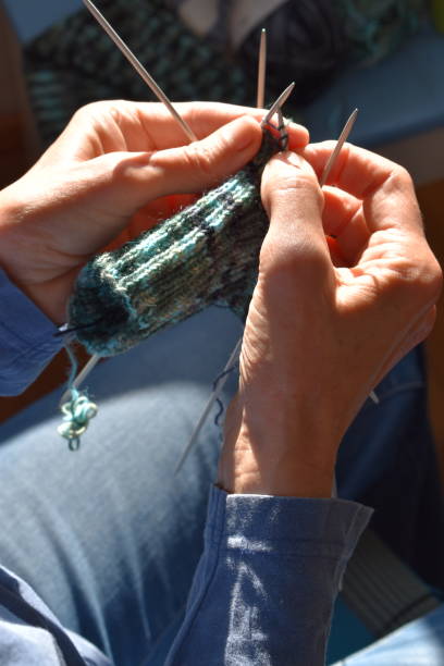 istock Knitting a pair of socks. 1337626651