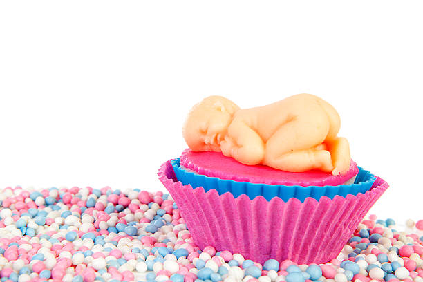 istock Birth cupcake with marzipan baby and colorful mice sweets 133762764