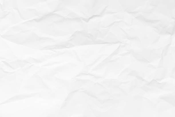 istock Grunge wrinkled white color paper textured background 1337632079