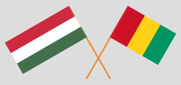 Vector illustration of Crossed flags of Hungary and Guinea. Official colors. Correct proportion