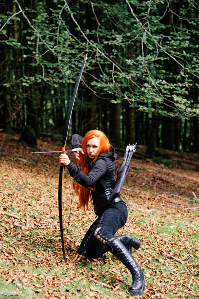 istock Warrior woman with hunting bow 1337635444