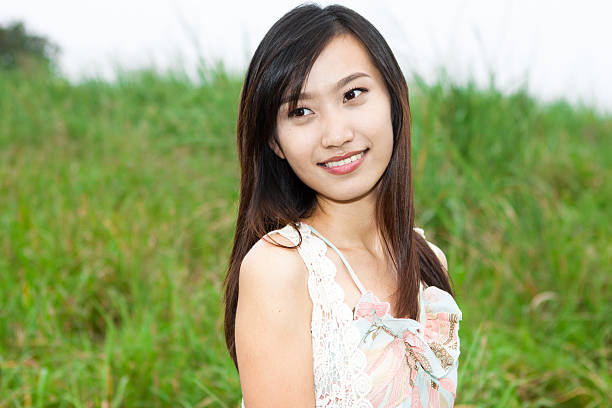istock Young beautiful Asian woman looking at camera 133763689