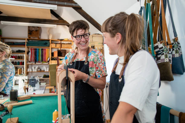 istock Working as a Team to Make Leather Shoes 1337638761