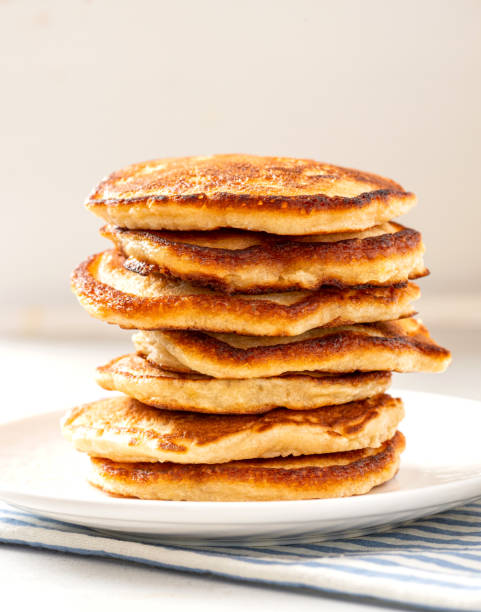 Homemade pancakes Homemade pancakes in a white plate on a gray concrete background. Tasty breakfast dissert stock pictures, royalty-free photos & images