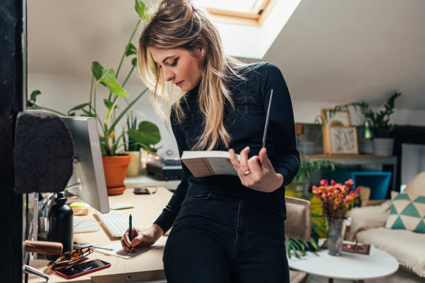 istock Beautiful Female Student Studying at Home 1337645321