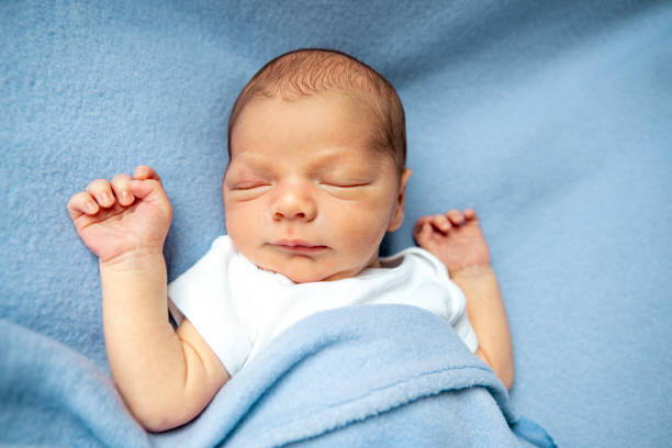 istock Newborn Baby Boy on Blue Blanket 1337645610
