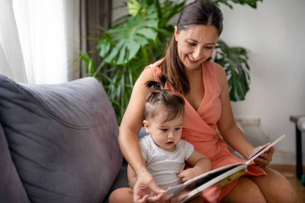 istock young mother reading a book to her toddler 1337645941