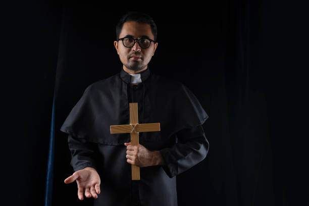 istock Priest is praying for god. 1337647194