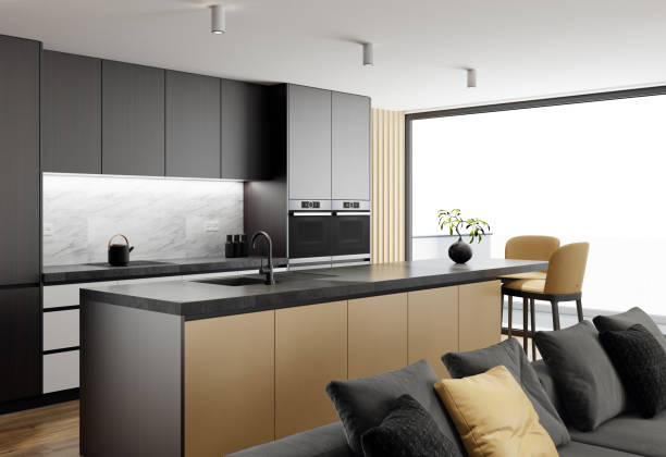 Luxury black interior living room with modern minimalist Italian style open space kitchen with big long kitchen island.