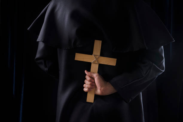 istock Priest is praying for god. 1337647226