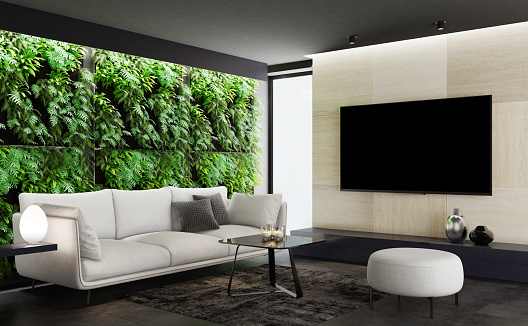 Moderno interior minimalista del apartamento. Salón con jardín vertical pared vegetal verde. Sala de TV. photo
