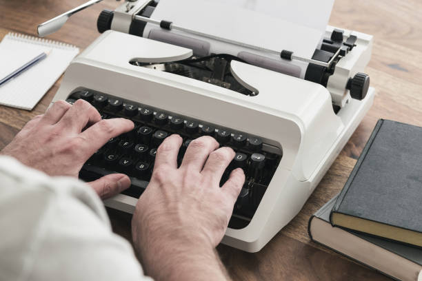 Writer Using Typewriter Person Typing On Typewriter Stock Photos, Pictures & Royalty-Free ...