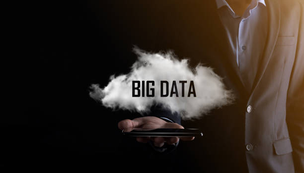 istock Businessman holds the inscription BIG DATA. Padlock , brain ,man, planet,graph, magnifier, gears, cloud, grid, document, letter, phone icon. 1337650413