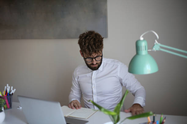 istock Man working on laptop stock photo 1337650869