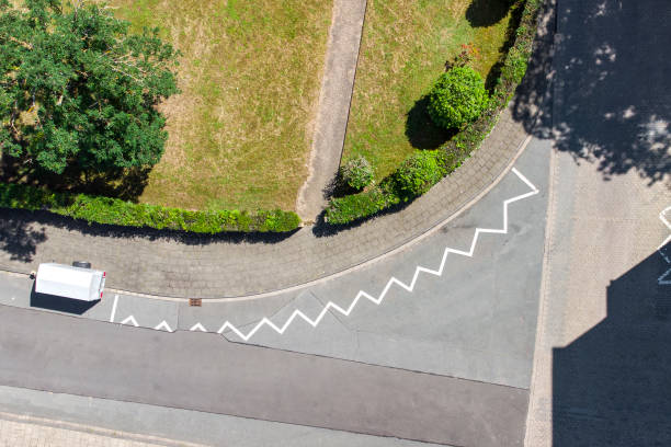 istock Road marking - road curve, aerial view 1337651622