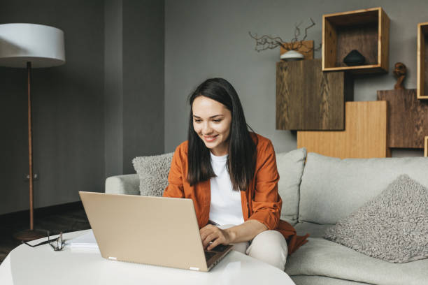 istock Woman Working at Home on Laptop 1337653852