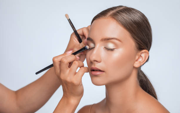 istock Beautiful woman with long eyelashes, beautiful make-up and thick eyebrows. Professional makeup and cosmetology skin care. 1337653941