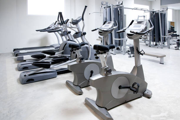 istock elliptical cross trainer, stationary bicycle treadmill 1337658633
