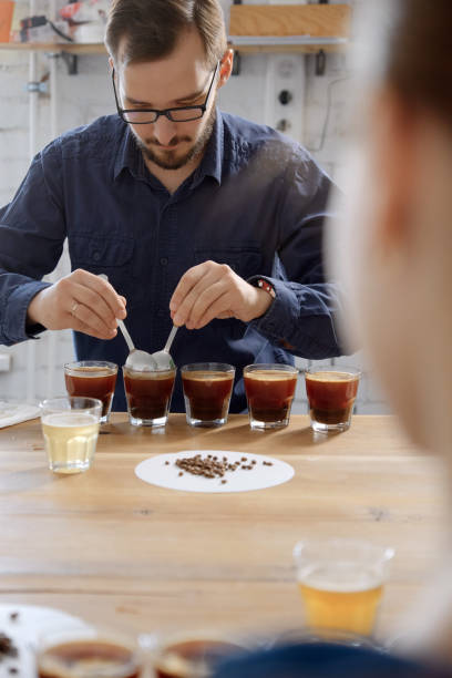 istock Barista examining freshly brewed coffee 1337665714