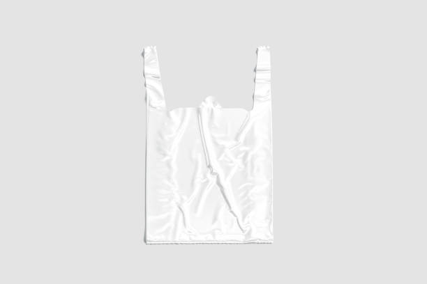 Blank white t-shirt plastic bag with handle mockup, gray background