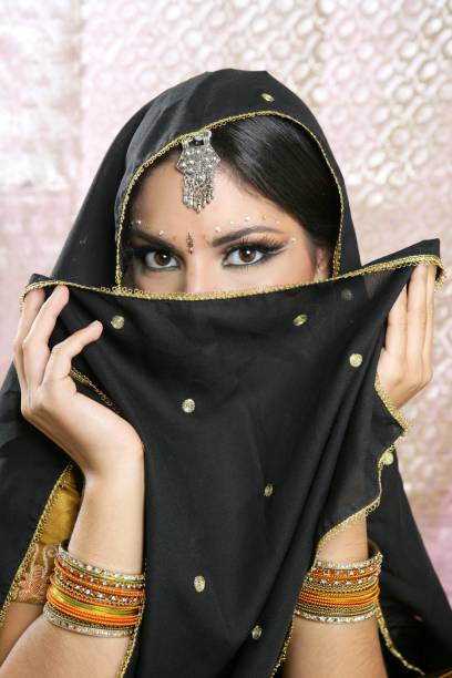 beautiful brunette asian girl with black veil on face - arabian nights imagens e fotografias de stock