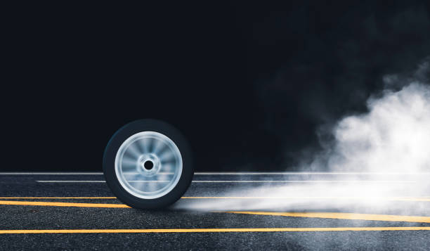 istock Car wheel burn rubber with spin circle motion on the asphalt road 1337685651
