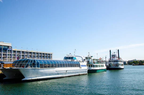 Tourboat at Kingston pier Tourboat at Kingston pier during summer day kingston harbour stock pictures, royalty-free photos & images