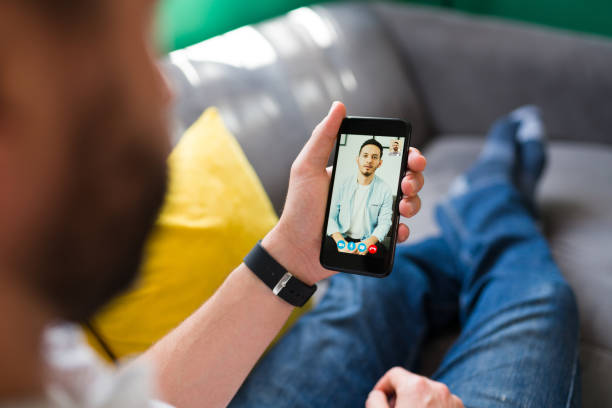 istock Close up of a man talking on a video call 1337712592