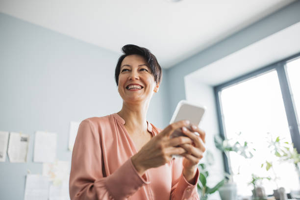 istock Mature woman at home 1337712646