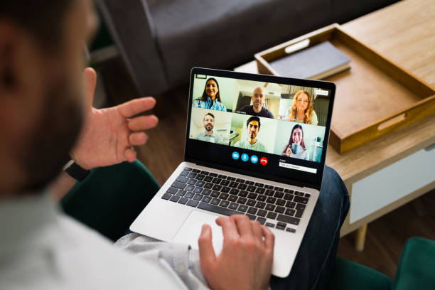 istock Young man talking with friends online 1337712651