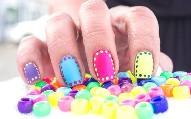 istock Bright Colorful Polka Dot Nail Art Design 1337716877