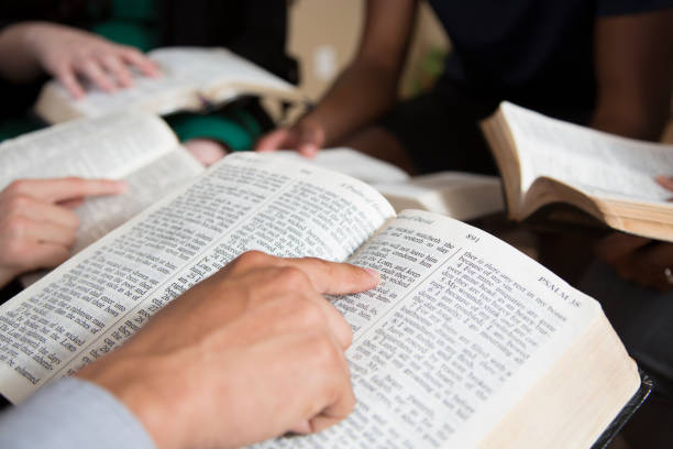 istock Bible Study.   Multi Ethnic Group.Multi Ethnic Group of friends meet for a Bible Study.  Group includes teenager, young adults, mid-adults and senior adult. 1337719614
