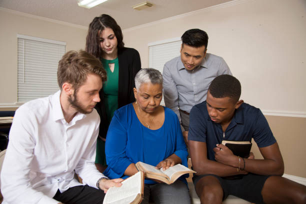 istock Bible Study.   Multi Ethnic Group.Multi Ethnic Group of friends meet for a Bible Study.  Group includes teenager, young adults, mid-adults and senior adult. 1337719636